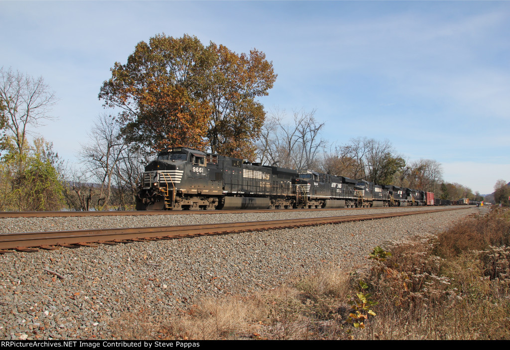 NS 9961 takes train 35A through MP116